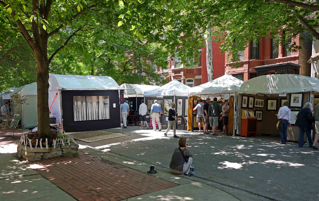 A Chicago neighborhood art fair on a tree-lined street