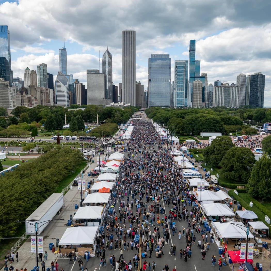 A Chicago food festival with crowds tasting dishes