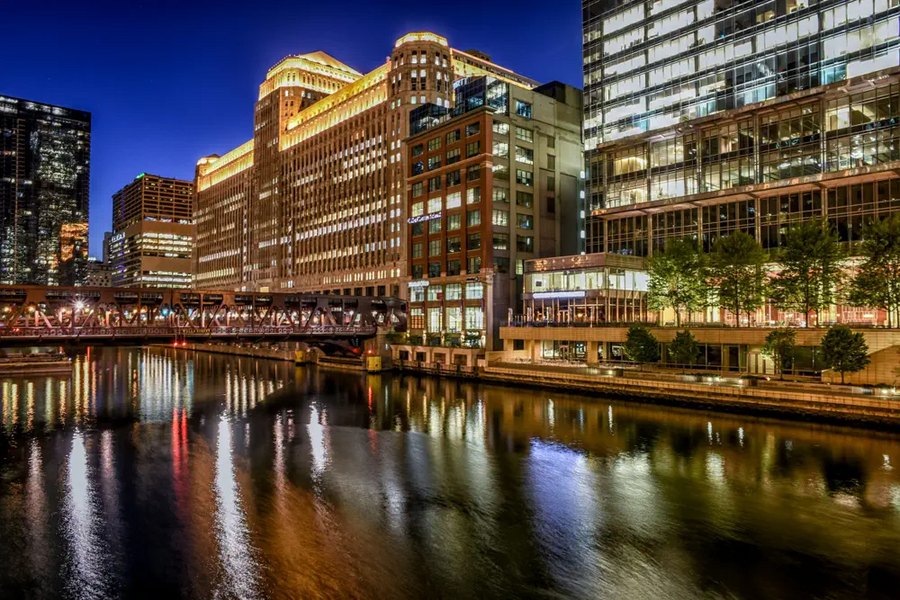 The Merchandise Mart lit up at night in River North
